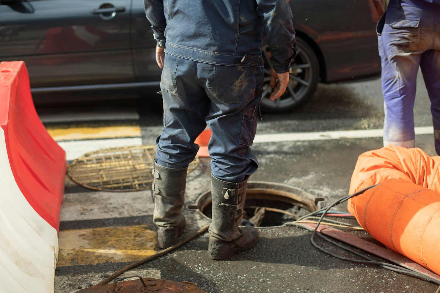 Road maintenance with safety barriers