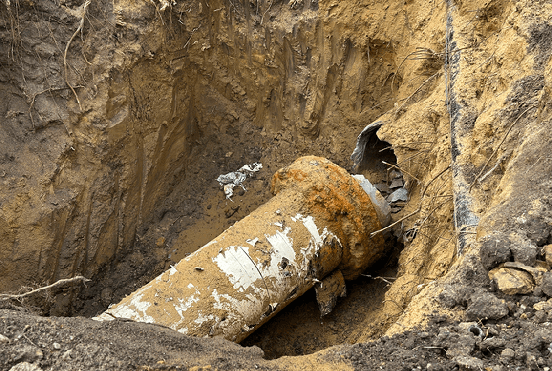 Buried pipe in a dirt trench
