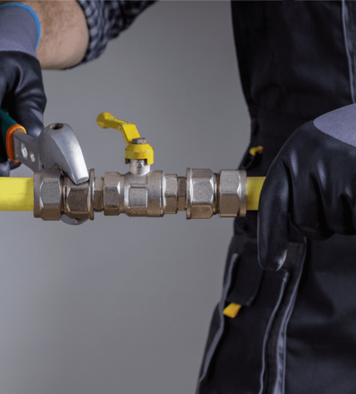 Person fixing metal pipe connection