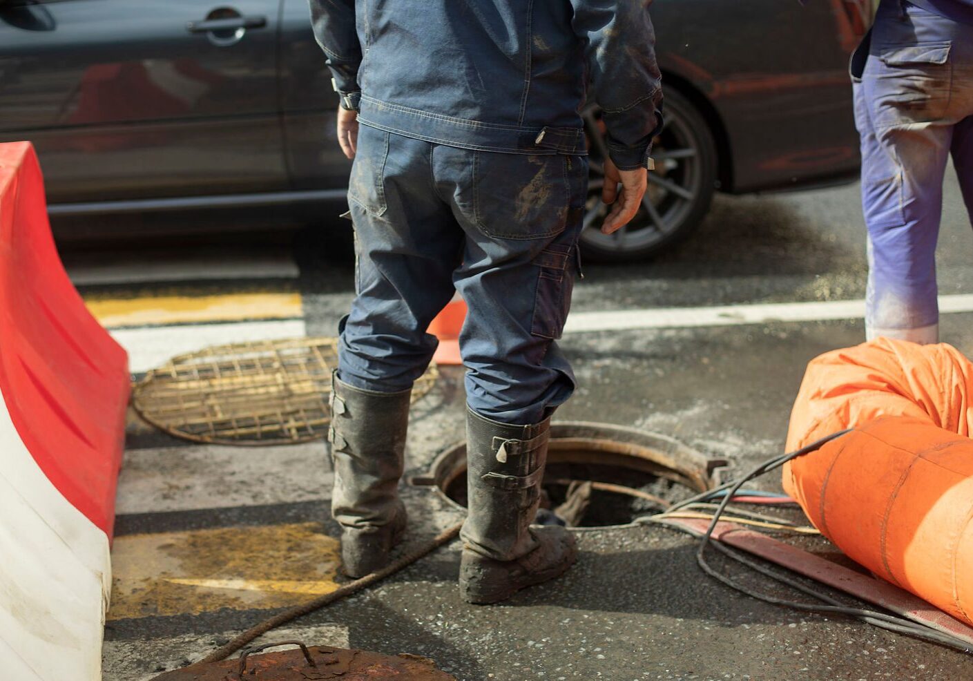 Road maintenance with safety barriers